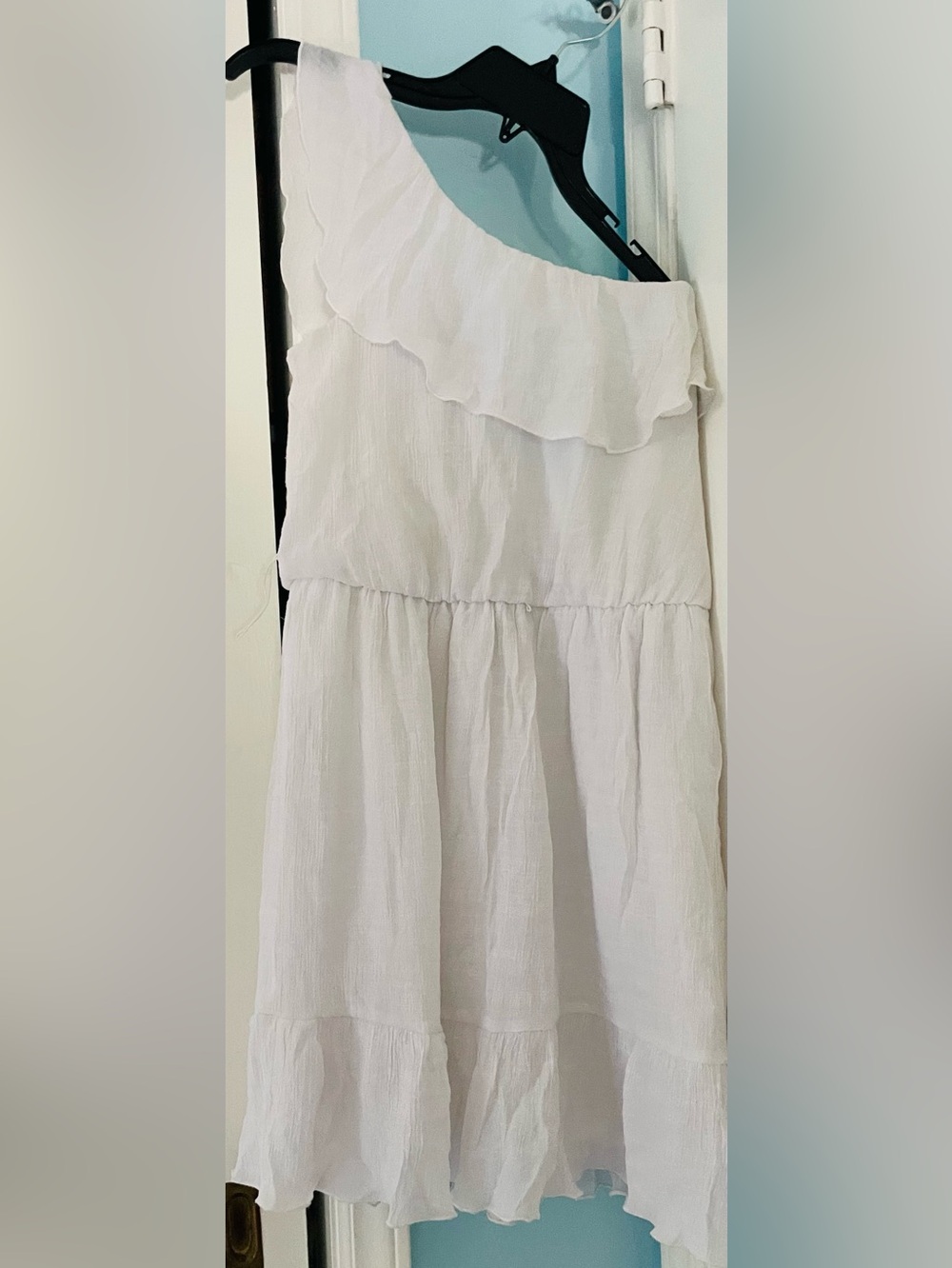 Give easy breezy summer vibes in a One-Shoulder Bright White Sundress!